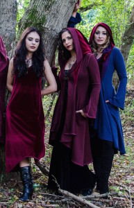accentuates clothing slip dress and red and blue hooded jackets on women models