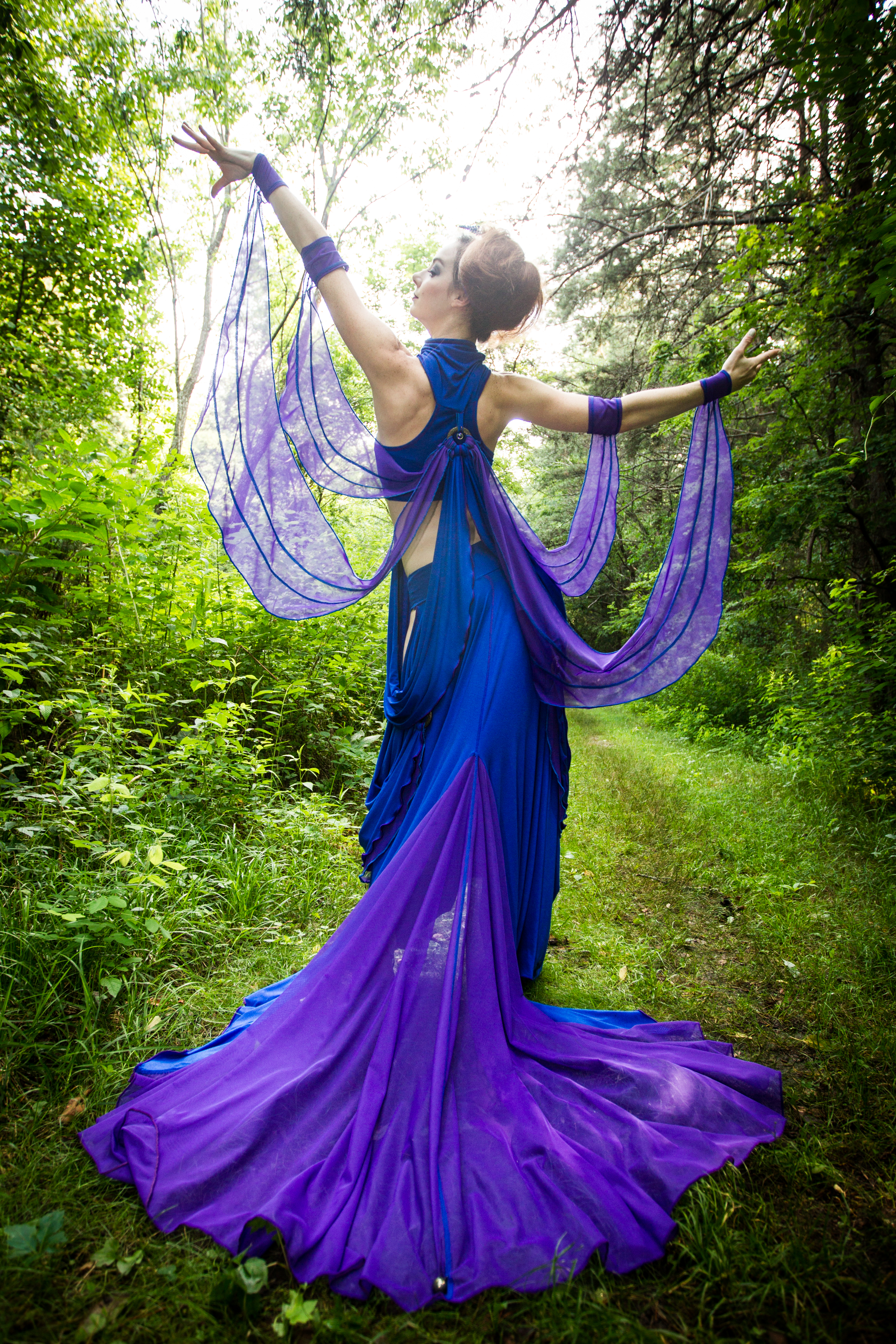 woman in blue dragonfly costume with purple wings by Accentuates Clothing