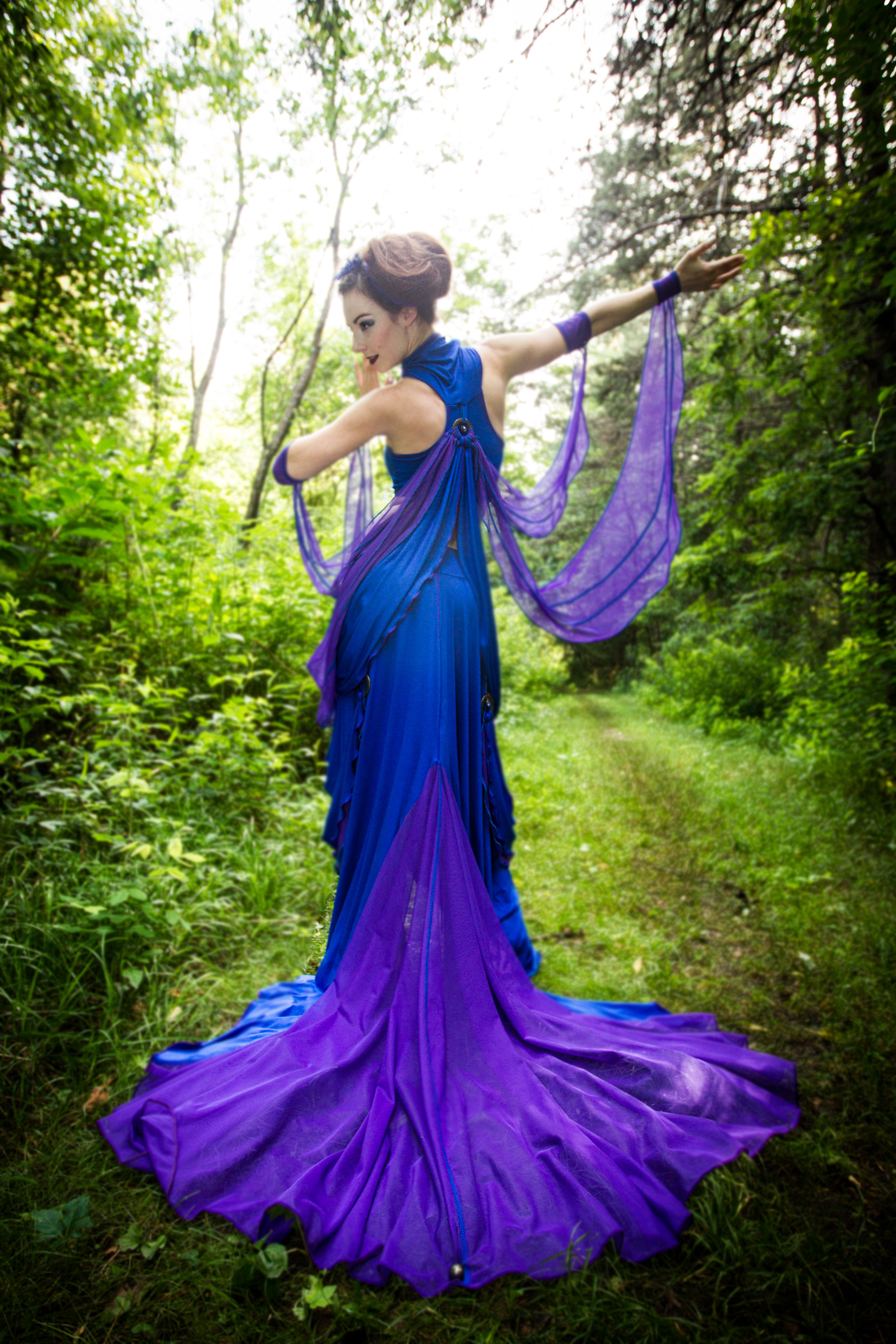 woman in sexy blue dragonfly costume with purple wings by Accentuates Clothing