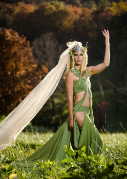 woman in field wearing meadow deva costume with giant veil headpiece by Accentuates Clothing