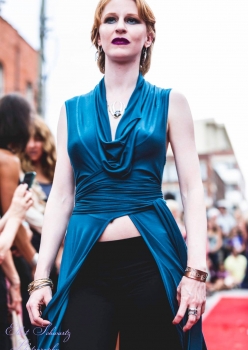redhead modern woman fashion model on runway